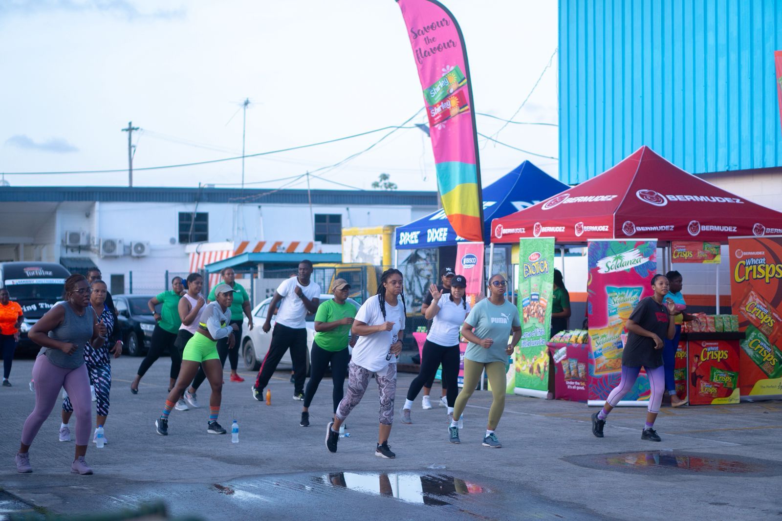 Outdoor Fitbox class with sponsor tents